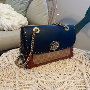Coach tea rose parker shoulder bag.
